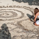emily making beach art